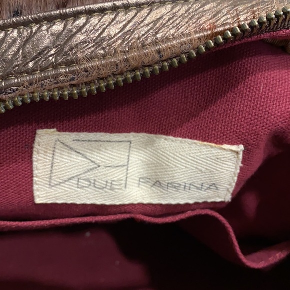 Real fur mid size distressed purse. - Picture 4 of 8